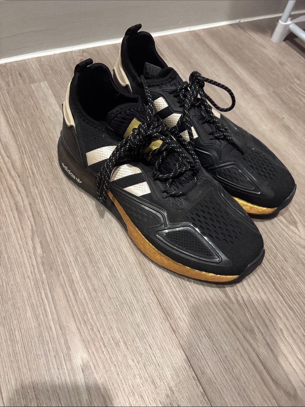 adidas women’s Black and Gold Athletic Sneakers